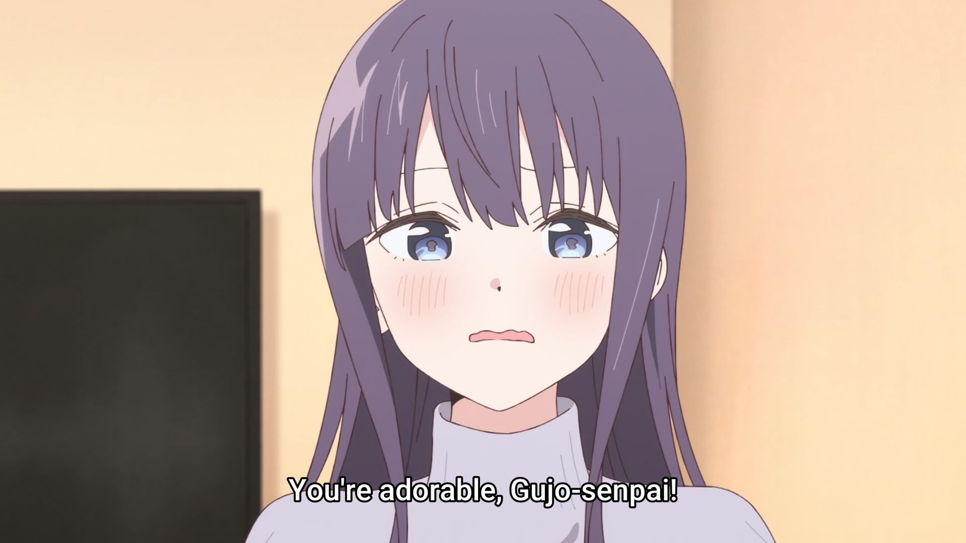 A flustered looking purple haired girl. Botan tells her that 'You are adorable, Gujo-senpai!'